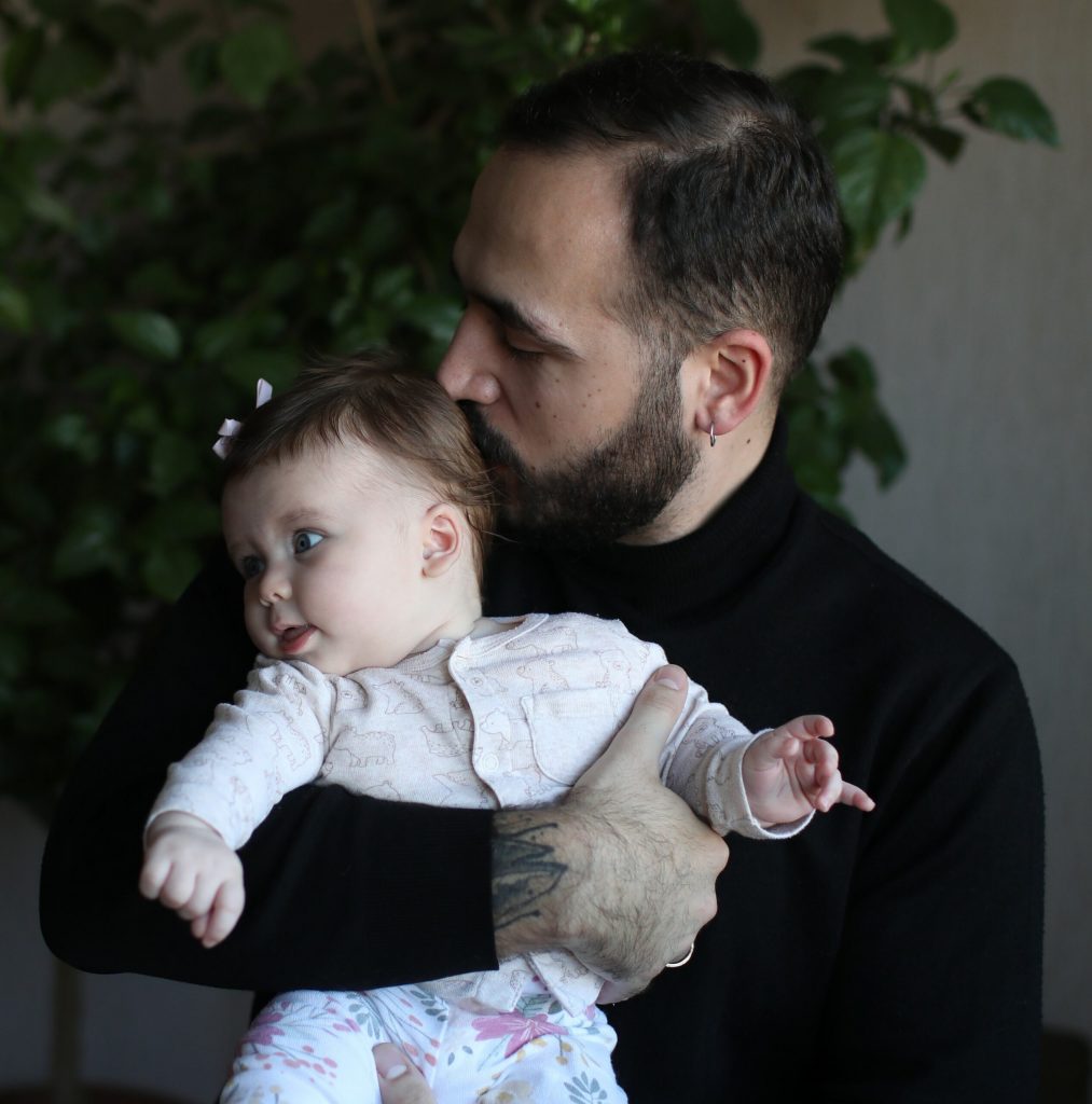 Giorgi, the parent of four-month-old Anisia